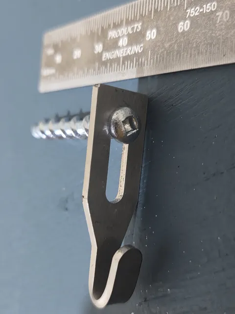 Centre hook fixed with a square-drive screw, angled view