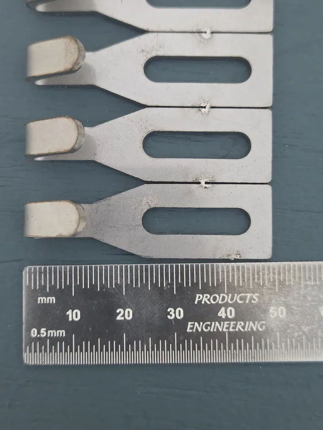 Centre Hook Small (50mm) stainless steel hooks above a steel rule marked in millimetres